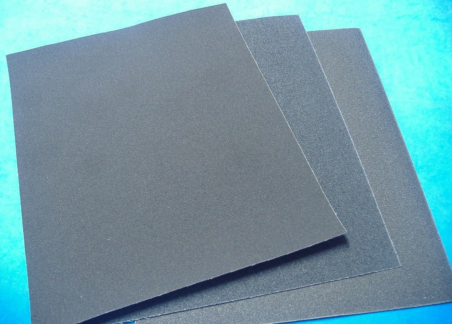 LOT OF THREE 9 X 11 ASSORTED GRIT EMERY CLOTH FINE MEDIUM COARSE