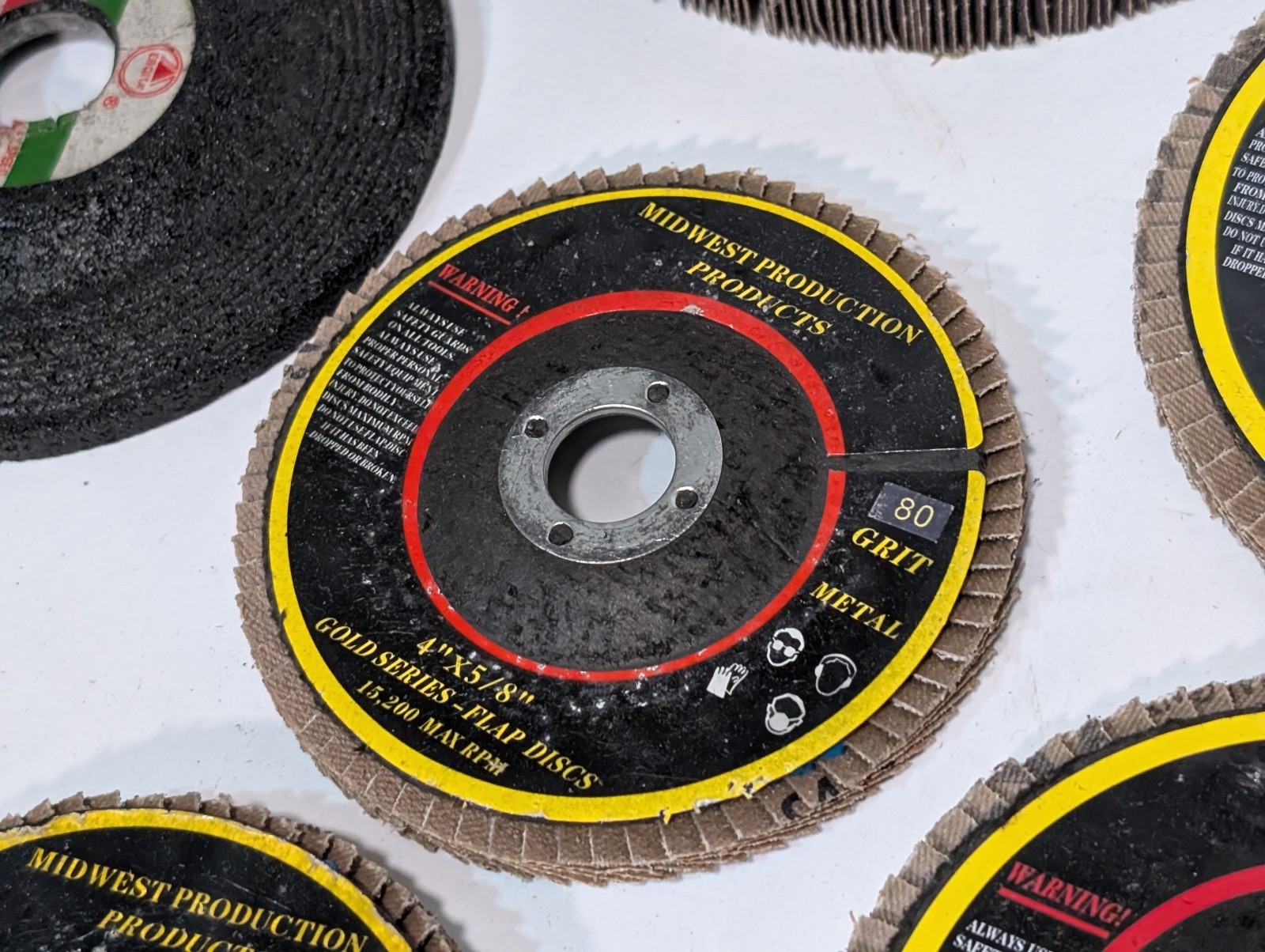 Lot of 70 Assorted Grinding and Sanding Wheels/Belts, Some Used, Most Unused